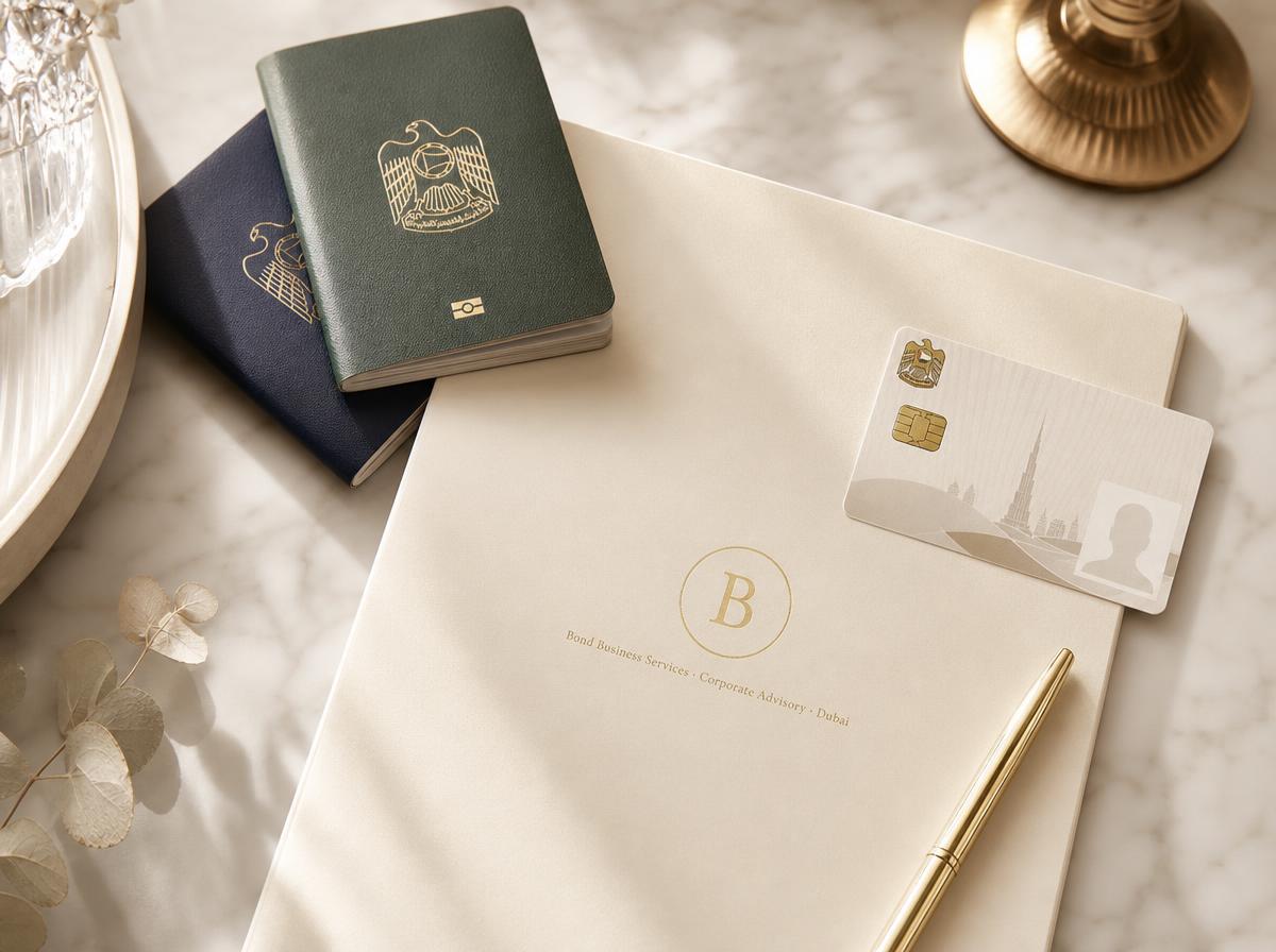 UAE passports, an Emirates ID and a Bond residency file on a marble desk